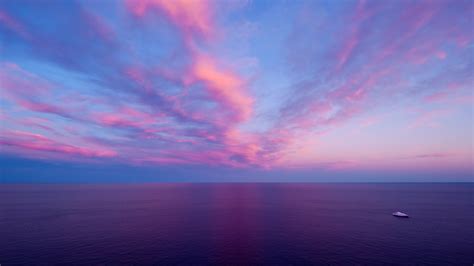 Get stunning sunset pictures in our handpicked collection for free. Ocean With Pink And Blue Sky During Sunset HD Pink ...