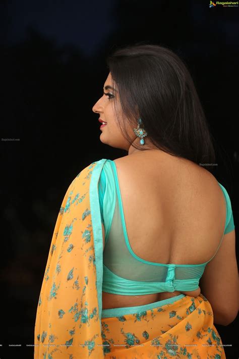 Saree Seduction Sonia Chowdary In Orange Saree And Blue Backless Blouse