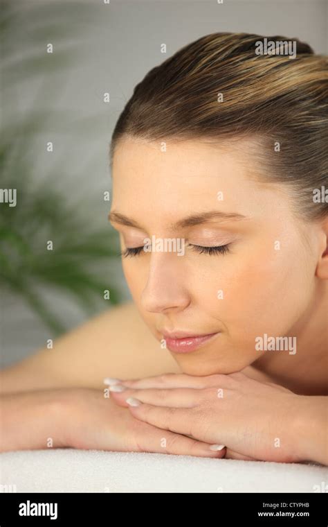Woman Relaxing On The Massage Table Stock Photo Alamy
