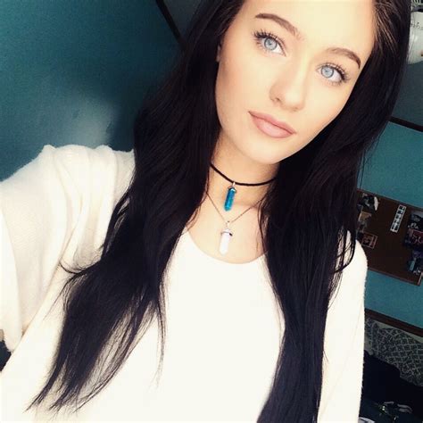 bright blue eyes dark hair and pale skin black hair pale skin brown hair blue eyes pale skin