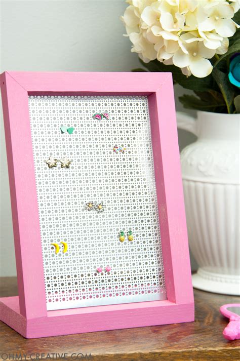I placed mine about 1/2 inch from the top. Easy DIY Jewelry Display for Earrings - Oh My Creative