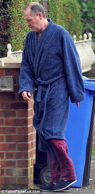 paul gascoigne puts the bins out in his first public appearance since being sectioned daily