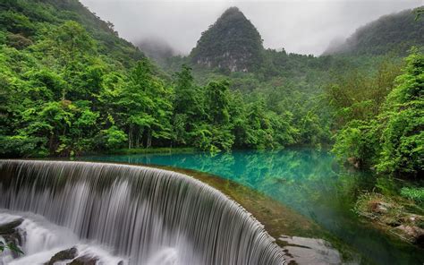 Online Crop Time Lapse Photography Of Waterfalls Surrounded By Green