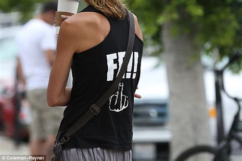 sharni vinson steps out in a naughty t shirt and baggy drop crotch