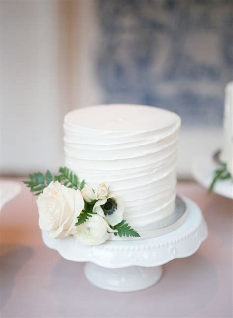 Raspaw Buttercream Wedding Cake With Blue Flowers