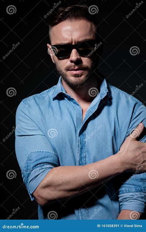Casual Man Standing And Holding His Arm Serious Stock Image Image Of