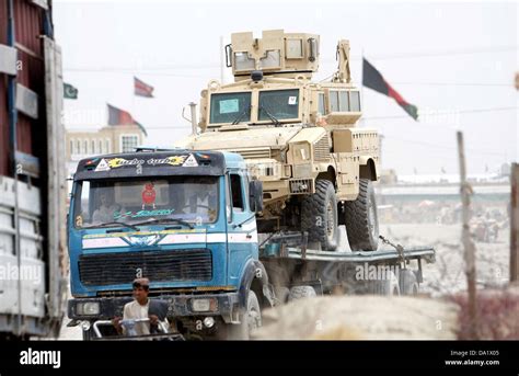 Trucks Carrying Us Military Equipments Coming From Kandahar Crossing
