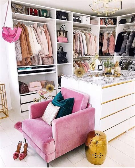 Trendy And Feminine Dream Closet With Pink Accents White Built In