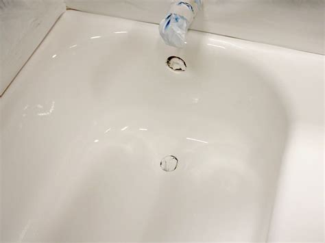 It has a stain as though there is bath. Bathtub drain overflow rust damage completed by ...