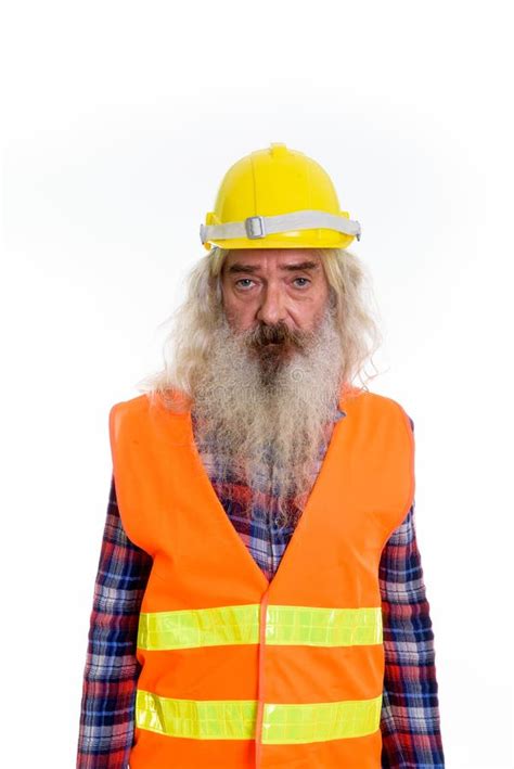 Studio Shot Of Senior Bearded Man Construction Worker Stock Photo