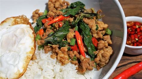 If you have been lucky enough to visit thailand and had this. Hot Thai Holy Basil Chicken - Pad Krapow Kai - Thai Street ...