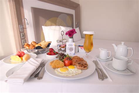 Room service is a service in a hotel by which meals or drinks are provided for guests in. Novotel World Trade Centre Dubai - In-room dining