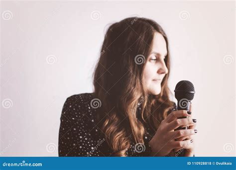 Young Woman With A Microphone In Hands Stock Photo Image Of Jazz