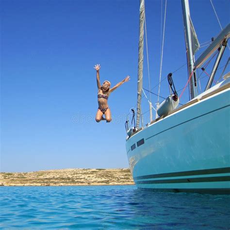 Girl Jumping In Sea Off Boat Stock Image Image Of Boat Caucasian