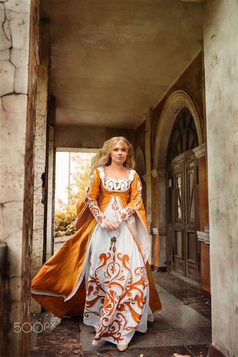lady in medieval costume beautiful lady with blond hairs in medieval dress medieval dress