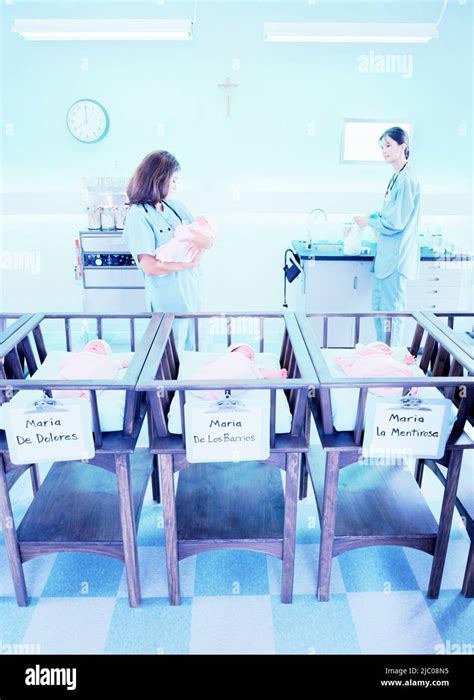Nurses Taking Care Of Babies At The Hospital Maternity Ward Stock Photo