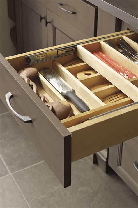 After measuring your drawer, you will use an exacto knife to cut five pieces of foam board to form a base and four side pieces. Tiered Cutlery Divider - Decora Cabinetry