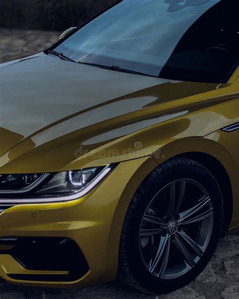 Vertical Shot Of A Volkswagen Arteon Gold Color Editorial Photo Image