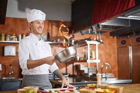 Professional Chef Cooking In Kitchen Stock Photo Image Of Happy Meal