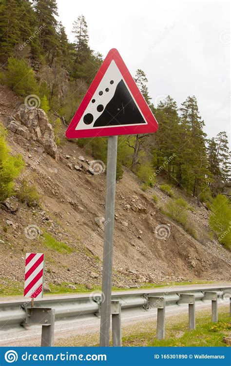 Road Sign Falling Rocks Stock Photo Image Of Summer 165301890