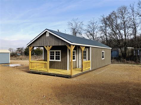Deluxe cabin built with an I-shaped porch and has three 2X3 windows