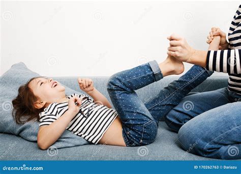 Mother Hands Holding Daughter Feet Stock Image Image Of Parent