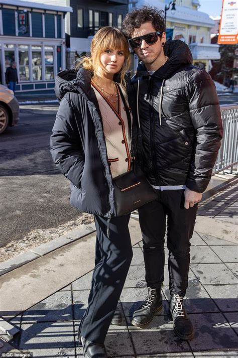 Debby Ryan And Beau Josh Dun Bundle Up In Heavy Black Coats As They Head Into Sundance Film