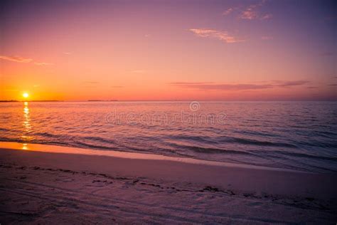 Beautiful Sunset Beach Chairs On The Sandy Beach Near The Sea Summer