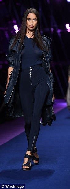 Gigi Hadid Goes Braless In A Sheer Navy Dress Alongside Sister Bella For Mfw Daily Mail Online