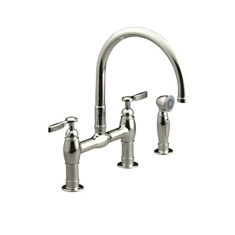 Nickel is similar to chrome in that they both have silver tones, with nickel having a slightly warmer tone. KOHLER Parq 2-Handle Bridge Kitchen Faucet with Side ...