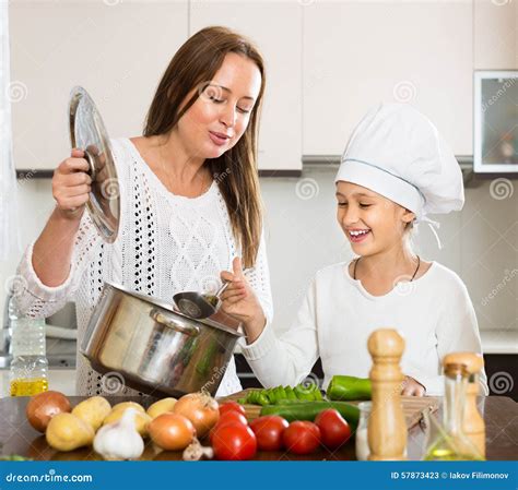 Mother And Daughter Cooking Together Stock Image Image Of Ingredient Mother 57873423