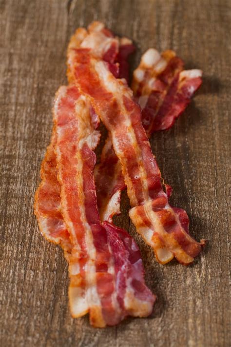 Let cool for 5 minutes for bacon to crisp. How Long to Bake Bacon? - Food Fanatic