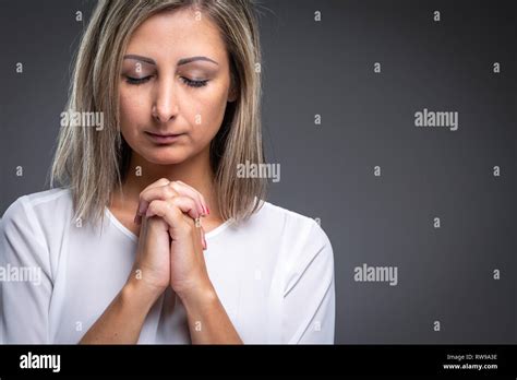 Praying Woman Woman Praying To Her God For The Good Health And