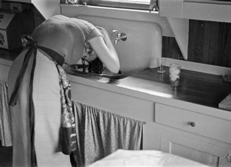 Photograph Of Doris Stiles Williams Washing Her Hair In The Sink