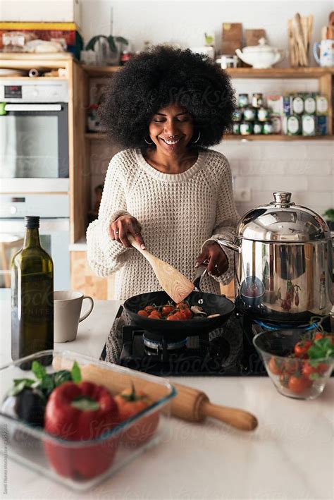 Beautiful Black Woman Cooking In Her Home Cooking Concept Cooking