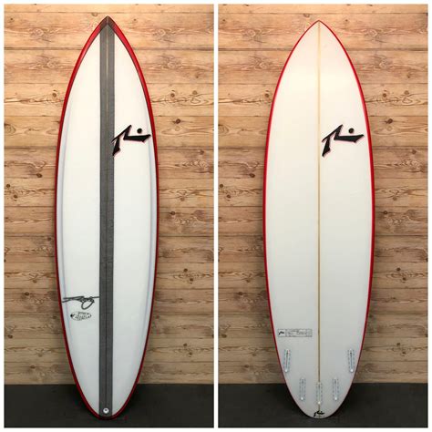 A long, narrow board made of wood or plastic, used for riding on waves as a thick surfboard floats well. 7' x 22.6 x 3.3 (57.2L) Rusty "Zeppelin" Surfboard - The ...