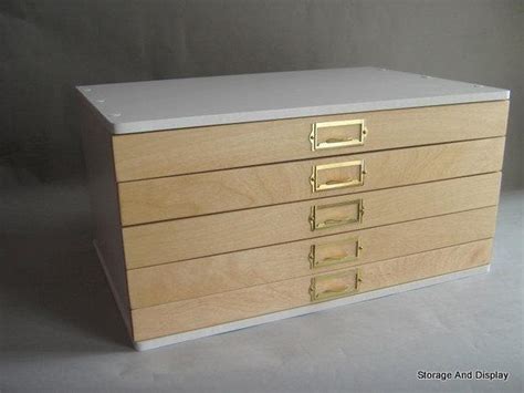 The typical office vertical file cabinet is 28½ inches deep and the drawer holds 27 inches of files. Storage Cabinet Collectors Cabinet Rubber Stamps