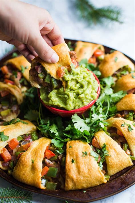 Try a few of these appetizers at your next dinner party or these elegant and delicious cold appetizers are easy to prepare and store in the refrigerator until your guests arrive. Holiday Wreath Taco Ring- this fully VEGAN holiday ...