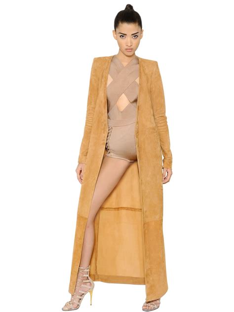 Animal hides have been used to make clothing and other items since the paleolithic era. Balmain Belted Suede Long Coat in Tan (Brown) - Lyst