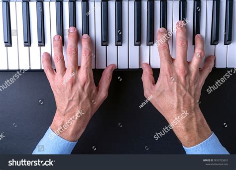 Pianists Hands Playing Piano Top View Stock Photo 1813725631 Shutterstock