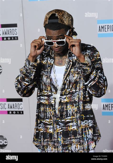 Rapper Soulja Boy Arrives At The 39th American Music Awards At Nokia