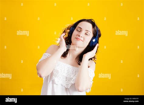 Woman Wearing Wireless Headphones Stock Photo Alamy