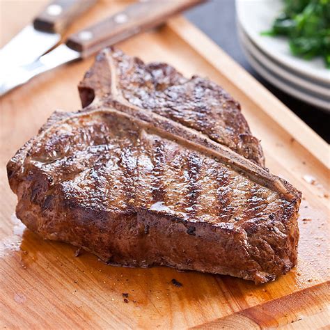 Build a fire (or turn on burners) on just one side of the grill. Grilled T-Bone Steaks with Lemon-Garlic Spinach | Cook's Country