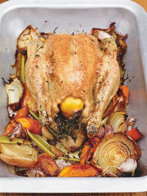 Cook and char for 10 minutes, turning halfway, while you pinch off and discard the tomato skins and roughly chop one or two of the chillies to taste. Roast Chicken | Chicken Recipes | Jamie Oliver Recipes