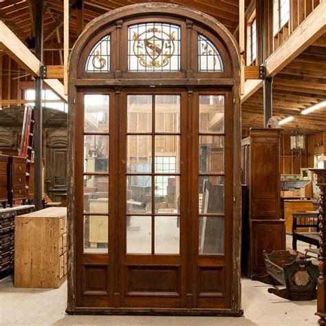 Antique Tall Glass French Doors With Stained Glass Arched Transom With