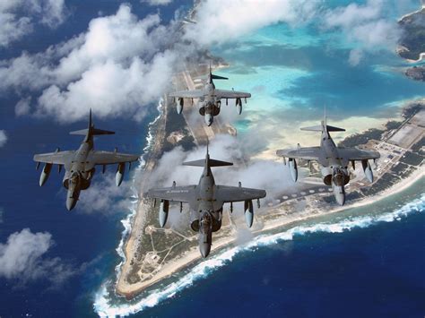 Four Usmc Av 8b Harrier Iis Fly In Formation Over Wake Island Airfield