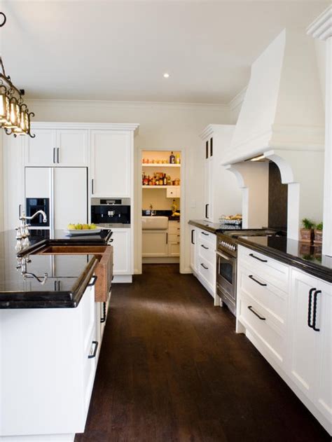 For more gloss, use mineral oil. Black Handle White Cabinets | Houzz