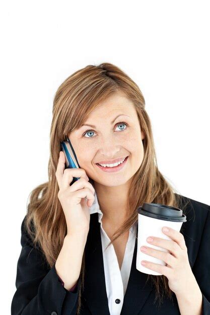 premium photo blond businesswoman talking on phone holding coffee
