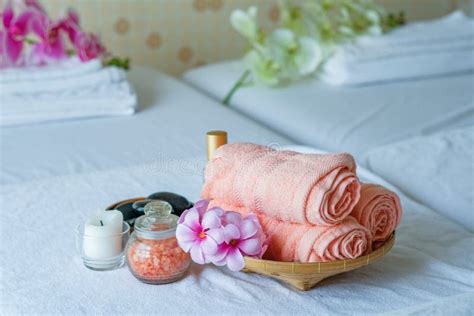 spa treatment set and aromatic massage oil on bed massage thai setting for aroma therapy and