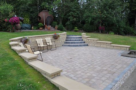 Curved Patio With Retaining Wall And Contrasting Steps Backyard
